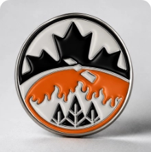 Black and orange lapel pin